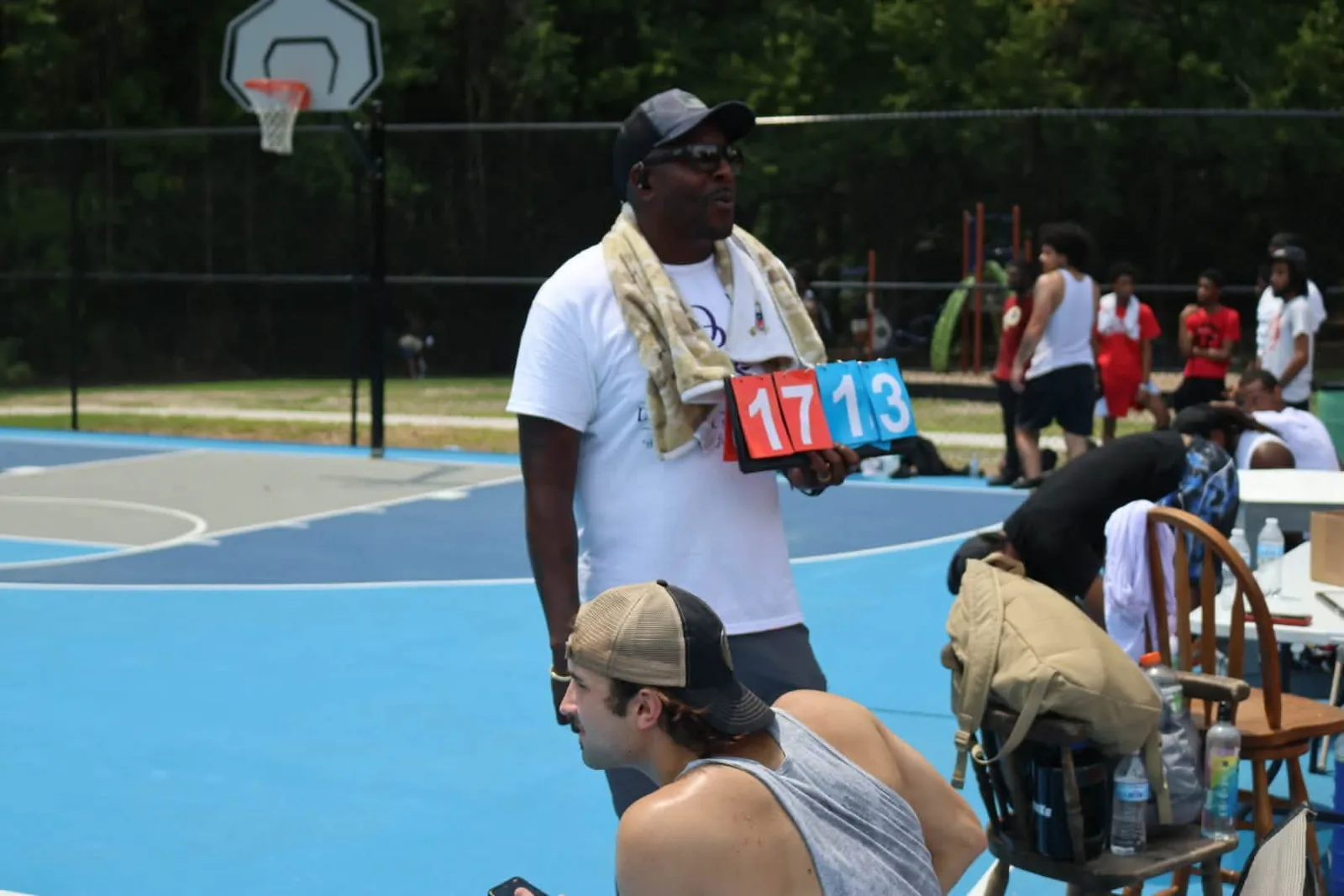 CJ Turrentine helping at a youth activity in a Vance County park